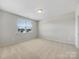 Simple bedroom with neutral walls and carpeted floors at 368 Pleasant Hill Se Dr, Concord, NC 28025