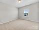 Bright bedroom with neutral walls and carpeting at 368 Pleasant Hill Se Dr, Concord, NC 28025