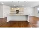 Modern kitchen with a large island and updated cabinetry at 368 Pleasant Hill Se Dr, Concord, NC 28025