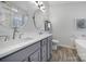 Elegant bathroom with double vanity and soaking tub at 3812 Leela Palace Way, Fort Mill, SC 29708