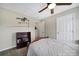 Well-lit bedroom with a ceiling fan and plenty of storage at 3812 Leela Palace Way, Fort Mill, SC 29708