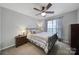 Charming bedroom with an iron bed frame and window views at 3812 Leela Palace Way, Fort Mill, SC 29708