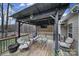 Deck features a pergola, comfortable seating, and a backyard view at 3812 Leela Palace Way, Fort Mill, SC 29708