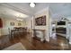 Formal dining room with hardwood floors, chandelier, and glass-top table at 3812 Leela Palace Way, Fort Mill, SC 29708