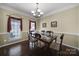 Formal dining room with hardwood floors and a chandelier at 3812 Leela Palace Way, Fort Mill, SC 29708