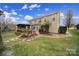 Two-story house showcasing a deck, pergola, and stone walkway at 3812 Leela Palace Way, Fort Mill, SC 29708