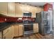 Well-equipped kitchen with stainless steel appliances and dark countertops at 3812 Leela Palace Way, Fort Mill, SC 29708