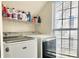 Laundry room with washer, dryer, and shelving for storage at 3812 Leela Palace Way, Fort Mill, SC 29708