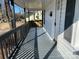 Front porch with gray deck and dark railings at 518 W White St, Chester, SC 29706