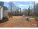 Large backyard with shed and wooded area at 5605 Miami Ln, Concord, NC 28025