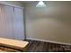 Bright dining area with sliding glass doors and laminate flooring at 5732 Prescott Ct, Charlotte, NC 28269