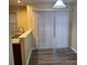 Dining area with sliding glass doors and laminate flooring at 5732 Prescott Ct, Charlotte, NC 28269