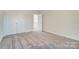 Bright bedroom with neutral carpet and double doors at 5763 Crown Ter, Hickory, NC 28601