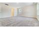 Bright bedroom with neutral carpeting and access to a full bathroom at 5763 Crown Ter, Hickory, NC 28601