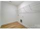 Laundry room with wire shelving and vinyl flooring at 5763 Crown Ter, Hickory, NC 28601