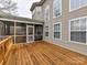 Spacious deck with access to screened porch and backyard at 585 Ambergate Nw Pl, Concord, NC 28027