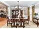 Formal dining room with chandelier and hardwood floors at 585 Ambergate Nw Pl, Concord, NC 28027