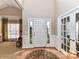 Elegant entryway with hardwood floors and French doors at 585 Ambergate Nw Pl, Concord, NC 28027