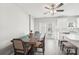 Dining area with wooden table, chairs and access to the backyard at 6033 Creft Cir, Indian Trail, NC 28079