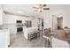 Spacious kitchen boasts an island, white cabinets, and stainless steel appliances at 6033 Creft Cir, Indian Trail, NC 28079