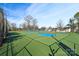 Dual community tennis courts with fencing at 6033 Creft Cir, Indian Trail, NC 28079