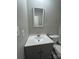 Bathroom featuring a vanity and a mirror at 6126 Bent Tree Ct, Charlotte, NC 28212