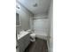 Bathroom with a tub, toilet, and gray vanity at 6126 Bent Tree Ct, Charlotte, NC 28212