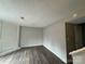 Simple living room with laminate flooring at 6126 Bent Tree Ct, Charlotte, NC 28212