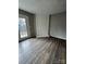 Living room featuring a fireplace and dark laminate flooring at 6126 Bent Tree Ct, Charlotte, NC 28212