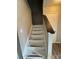 Indoor view of worn wooden stairs leading to the upper level at 6126 Bent Tree Ct, Charlotte, NC 28212