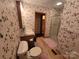 Bathroom featuring a toilet, sink, and shower stall at 625 Teddar Rd, Mount Gilead, NC 27306