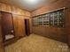 Small bathroom with brick walls and tiled floor at 625 Teddar Rd, Mount Gilead, NC 27306