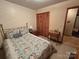 Bright bedroom featuring a double bed and built-in closet at 625 Teddar Rd, Mount Gilead, NC 27306