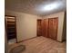 Large bedroom with a closet and built-in shelving at 625 Teddar Rd, Mount Gilead, NC 27306