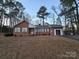 Brick ranch house with attached garage and yard at 625 Teddar Rd, Mount Gilead, NC 27306