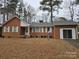 Brick ranch house with attached garage and yard at 625 Teddar Rd, Mount Gilead, NC 27306