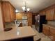 Kitchen boasts stainless steel appliances and oak cabinets at 625 Teddar Rd, Mount Gilead, NC 27306