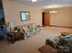 Spacious living room featuring floral sofas and carpet at 625 Teddar Rd, Mount Gilead, NC 27306