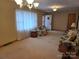 Living room with comfy seating and access to entryway at 625 Teddar Rd, Mount Gilead, NC 27306