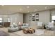 Open living space featuring a neutral color scheme and stylish furnishings at 718 Falling Oak Aly, Huntersville, NC 28078