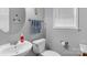 Clean and well-maintained half bathroom with a pedestal sink at 7845 Kuck Rd, Mint Hill, NC 28227