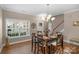 Dining room with hardwood floors and chandelier at 7845 Kuck Rd, Mint Hill, NC 28227