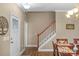 Entryway with staircase and view into dining room at 7845 Kuck Rd, Mint Hill, NC 28227