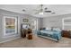 Main bedroom with a king-size bed and plenty of natural light at 7845 Kuck Rd, Mint Hill, NC 28227