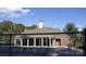 Community pool house with columns and a view of the pool at 7845 Kuck Rd, Mint Hill, NC 28227