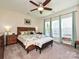 Bright bedroom with ceiling fan and ample natural light at 8024 Carolina Lakes Way, Fort Mill, SC 29707