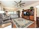 Living room showcasing hardwood floors, a ceiling fan, and comfortable seating at 8024 Carolina Lakes Way, Fort Mill, SC 29707