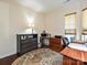 Comfortable home office with hardwood floors, natural light and neutral wall color at 8024 Carolina Lakes Way, Fort Mill, SC 29707