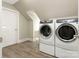 Convenient laundry room with washer, dryer, and extra storage space at 813 Garbow Ct, Charlotte, NC 28270