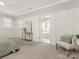 Main bedroom with en-suite bath and a view into the bathroom at 813 Garbow Ct, Charlotte, NC 28270